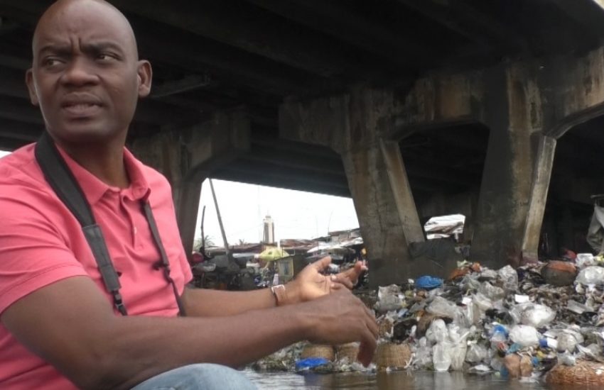 Director of the Benin Environment and Education Society (BEES) shows plastic pollution in Benin