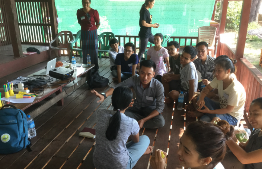 Members of civil society organisations follow a workshop on community engagement