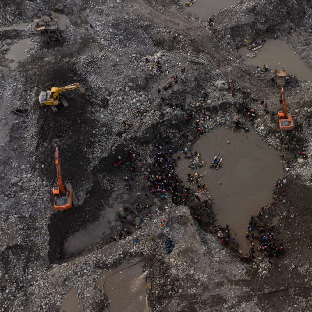 Backhoe loaders mining in Ecuador Photo by Ivan Castaneira