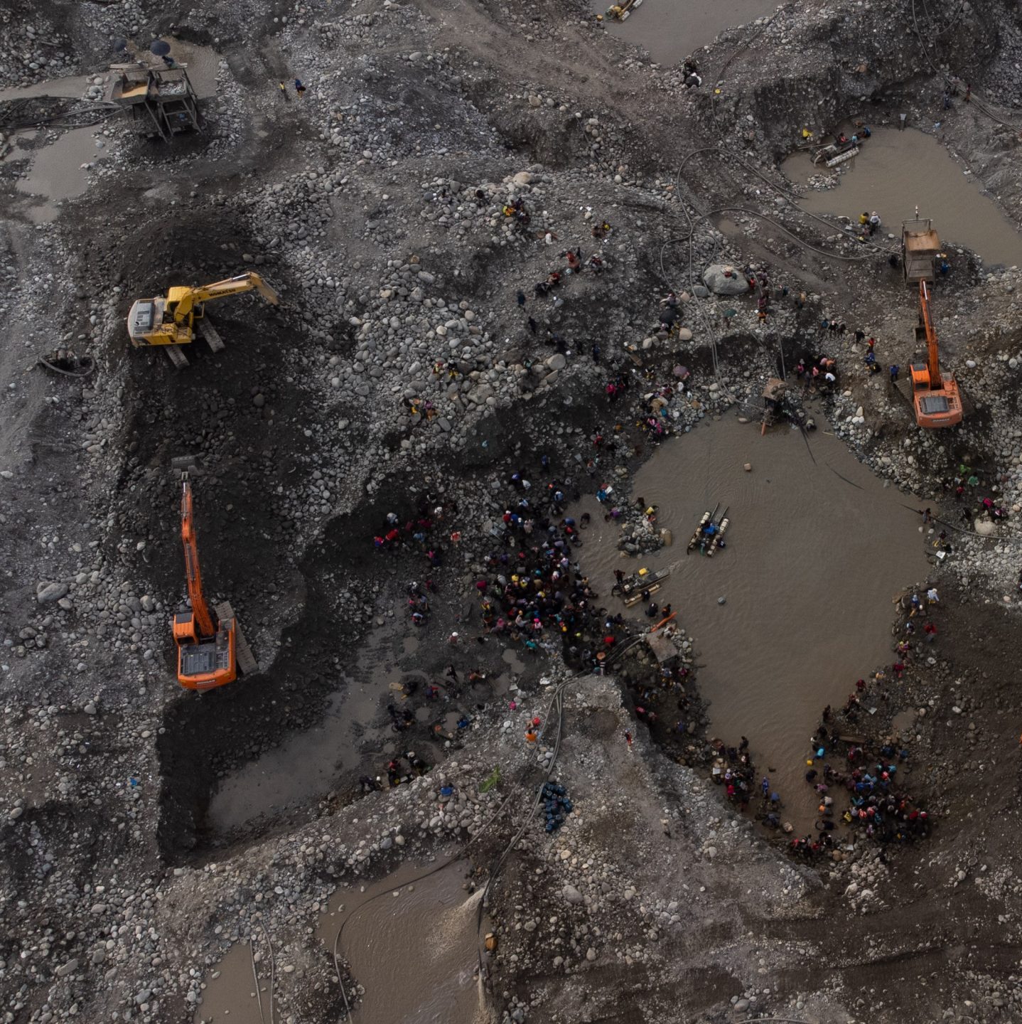 Backhoe loaders mining in Ecuador Photo by Ivan Castaneira